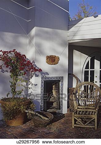 Patios Fireplace White Stucco Walls Glazed Patterned Tile