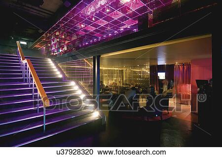 People hanging out in lounge area of nightclub View Large Photo Image Stock Image - People hanging out in lounge area of nightclub. Fotosearch