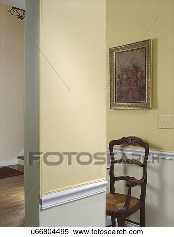 Picture frame above wooden chair with column in foreground View Large Photo Image Stock Photography - Picture frame above wooden chair with column in foreground. Fotosearch