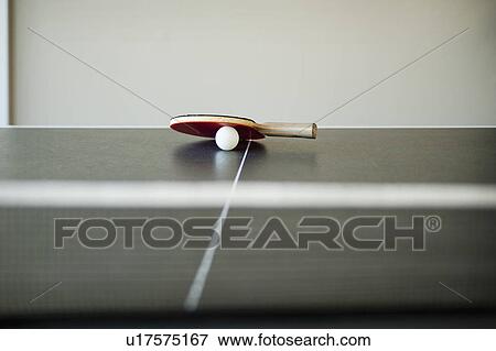 Ping pong ball and bat on table View Large Photo Image Stock Photo - Ping pong ball and bat on table. Fotosearch
