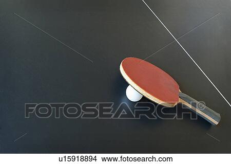 Ping pong paddle with ball on table View Large Photo Image Picture - Ping pong paddle with ball on table. Fotosearch