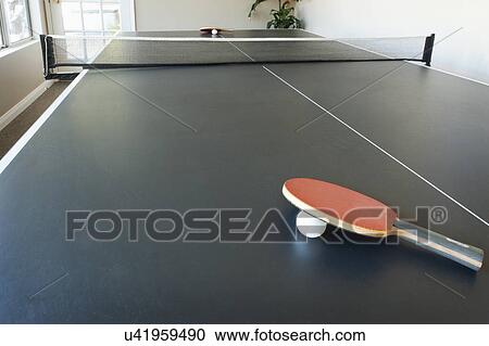 Stock Image - Ping pong table in sunroom of home, San Diego, California, United States of America. Fotosearch