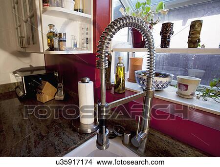Picture - Pull down kitchen faucet. Fotosearch