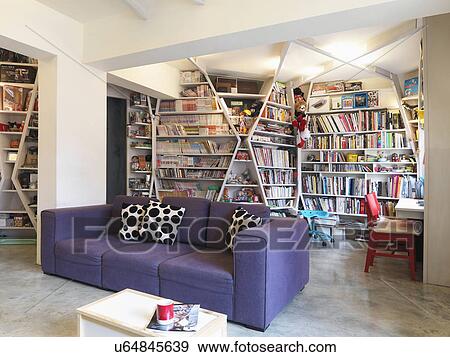 Stock Photo - Purple sofa in modern home; Taipei; Taiwan. Fotosearch