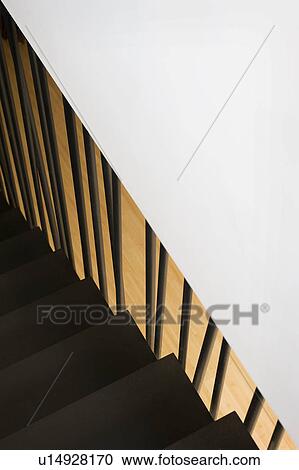 Stock Image - Railing along modern staircase, San Diego, California, USA. Fotosearch