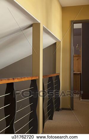 Railing along upstairs hallway; Burbank; California; USA View Large Photo Image Stock Image - Railing along upstairs hallway; Burbank; California; USA. Fotosearch