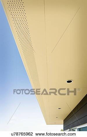 Stock Image - Recessed lights on ceiling of porch. Fotosearch