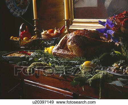 Stock Photo - Roasted turkey on sideboard for thanksgiving. Fotosearch