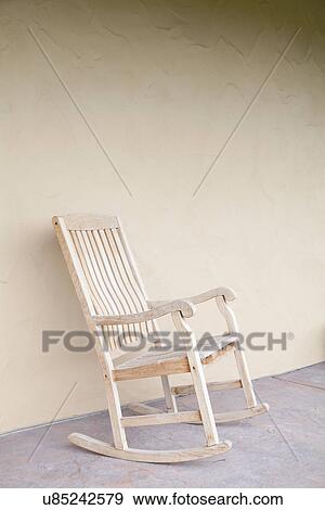 Rocking chair on patio; Bakersfield; California; USA View Large Photo Image Stock Photo - Rocking chair on patio; Bakersfield; California; USA. Fotosearch