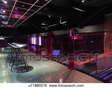 Row of bar stools in modern nightclub View Large Photo Image Stock Photograph - Row of bar stools in modern nightclub. Fotosearch