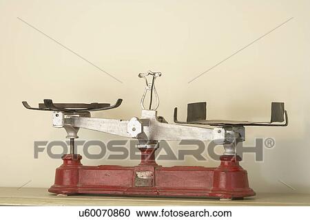 Stock Image - Scales Collection: Drop out of red counter scale, single beam, 25kg, antique cast iron, possible Henry Torbennen, Philadelphia, maker. Fotosearch