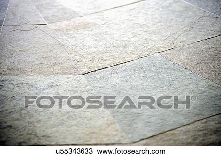 Stock Image - Selective focus of tiled floor; Cardiff by the Sea; California; USA. Fotosearch