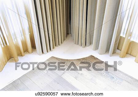 Sheer curtain near hardwood floor View Large Photo Image Stock Photo - Sheer curtain near hardwood floor. Fotosearch