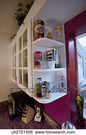 Shelves above kitchen sink; Seal Beach; California; USA View Large Photo Image Stock Photograph - Shelves above kitchen sink; Seal Beach; California; USA. Fotosearch