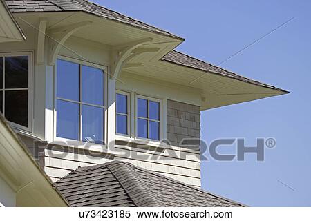 Stock Photography - Single family home with shingled rooftop. Fotosearch
