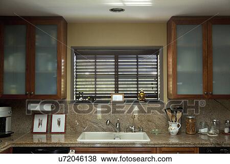 Sink and cabinets in contemporary kitchen; Burbank; California; USA View Large Photo Image Stock Photo - Sink and cabinets in contemporary kitchen; Burbank; California; USA. Fotosearch