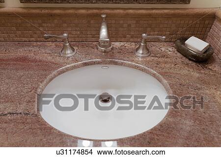 Sink and countertop in bathroom; Laguna Beach; California; USA View Large Photo Image Picture - Sink and countertop in bathroom; Laguna Beach; California; USA. Fotosearch