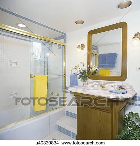 Sink and shower glass in traditional bathroom View Large Photo Image Picture - Sink and shower glass in traditional bathroom. Fotosearch