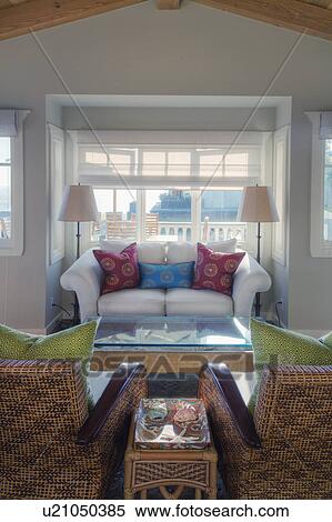 Stock Photography - Sofa and armchairs in living room of a beach home, Laguna Beach, California, USA. Fotosearch