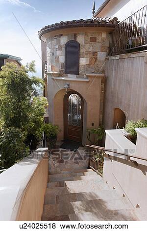 Staircase down to front entrance of contemporary home, Laguna Beach, California, USA View Large Photo Image Stock Photo - Staircase down to front entrance of contemporary home, Laguna Beach, California, USA. Fotosearch