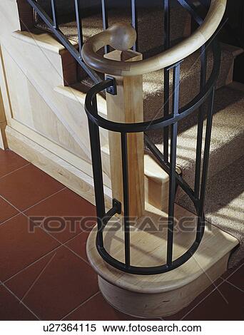Stairway-detail of iron rail near breakfast area. Tile floor. View Large Photo Image Stock Photography - Stairway-detail of iron rail near breakfast area. Tile floor. . Fotosearch