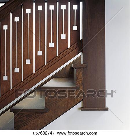 STAIRWAYS: Arts and Crafts quarter swan oak, stained dark, stylized flat spindle balusters, closer detail View Large Photo Image Stock Photo - STAIRWAYS: Arts and Crafts quarter swan oak, stained dark, stylized flat spindle balusters, closer detail. Fotosearch