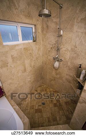 Stock Photo - Standup show with rain showerhead; Seal Beach; California; USA. Fotosearch