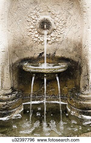 Stone fountain with running water; Santa Barbara; California; USA View Large Photo Image Stock Photograph - Stone fountain with running water; Santa Barbara; California; USA. Fotosearch