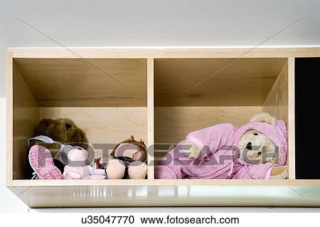 Stuffed bear in wooden cubby View Large Photo Image Stock Image - Stuffed bear in wooden cubby. Fotosearch