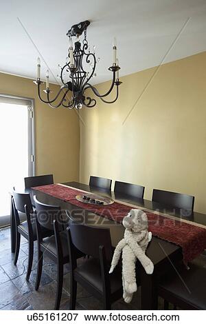Stuffed monkey on contemporary dining table; Burbank; California; USA View Large Photo Image Stock Photo - Stuffed monkey on contemporary dining table; Burbank; California; USA. Fotosearch