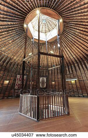Stock Photo - Sunlight peeking through center of yurt ceiling, Ojo Caliente, New Mexico, USA. Fotosearch