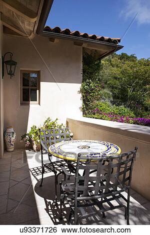 Table and chairs at porch, California, USA View Large Photo Image Stock Photograph - Table and chairs at porch, California, USA. Fotosearch