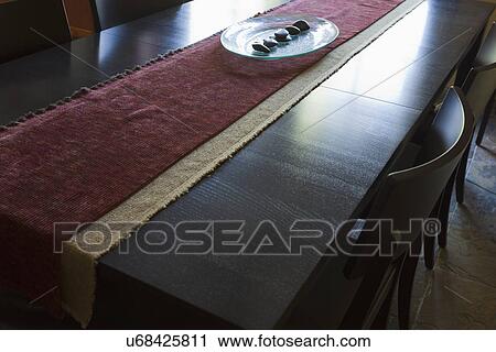 Table runner down center of contemporary table; Burbank; California; USA View Large Photo Image Stock Image - Table runner down center of contemporary table; Burbank; California; USA. Fotosearch