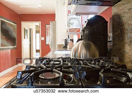 Tea kettle on gas stove top, Laguna Beach, California, USA View Large Photo Image Stock Image - Tea kettle on gas stove top, Laguna Beach, California, USA. Fotosearch