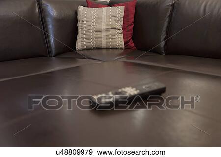 Television Remote On Leather Sofa Burbank California Usa