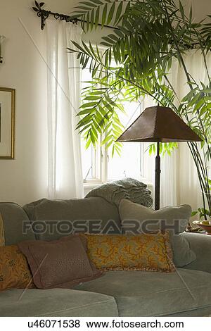 Throw pillows on sofa in living room; Carpinteria; California; USA View Large Photo Image Stock Photo - Throw pillows on sofa in living room; Carpinteria; California; USA. Fotosearch