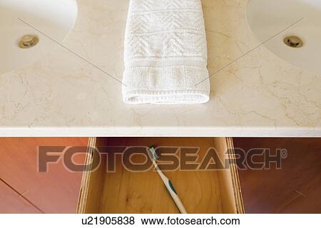 Toothbrush in drawer in bathroom; Burbank; California; USA View Large Photo Image Stock Photo - Toothbrush in drawer in bathroom; Burbank; California; USA. Fotosearch