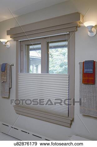 Towels and napkins hanging on rail by window blinds View Large Photo Image Stock Photo - Towels and napkins hanging on rail by window blinds. Fotosearch