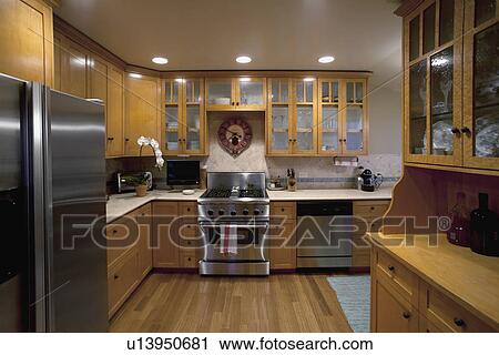 Traditional kitchen with stainless steel appliances, Laguna Beach, California, USA View Large Photo Image Stock Image - Traditional kitchen with stainless steel appliances, Laguna Beach, California, USA. Fotosearch