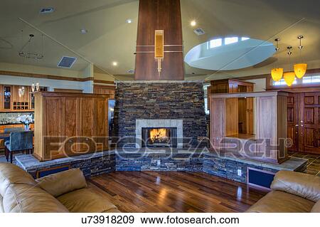 Traditional living room with stone fireplace View Large Photo Image Stock Photo - Traditional living room with stone fireplace. Fotosearch