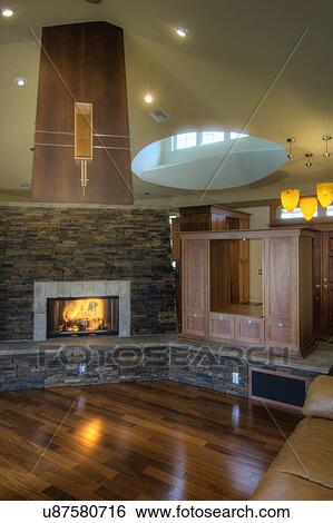 Traditional living room with stone fireplace View Large Photo Image Stock Photograph - Traditional living room with stone fireplace. Fotosearch