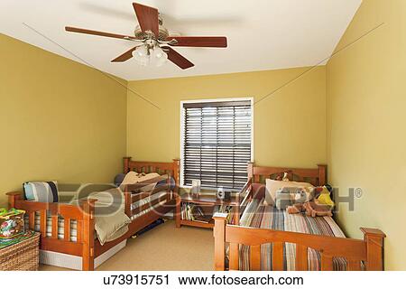 Stock Image - Twin beds in kids bedroom; Burbank; California; USA. Fotosearch