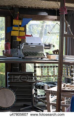 Stock Photo - Typewriter on wooden table. Fotosearch