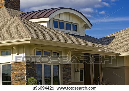 Unique dormer design with custom home View Large Photo Image Stock Photography - Unique dormer design with custom home. Fotosearch