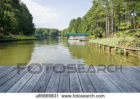 View of a river from the boardwalk View Large Photo Image Stock Image - View of a river from the boardwalk. Fotosearch