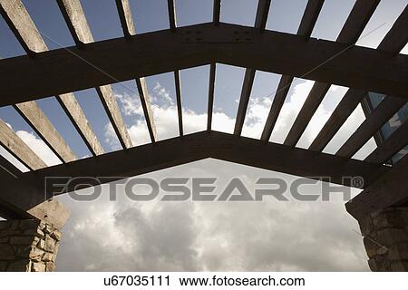 View through top of arbor to clouds in the sky; Aliso Viejo; California; USA View Large Photo Image Stock Image - View through top of arbor to clouds in the sky; Aliso Viejo; California; USA. Fotosearch