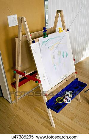Watercolors on kid's easel View Large Photo Image Stock Photography - Watercolors on kid's easel. Fotosearch