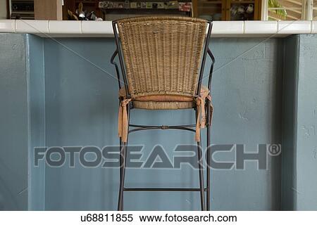 Wicker chair at breakfast bar; Carpinteria; California; USA View Large Photo Image Stock Photography - Wicker chair at breakfast bar; Carpinteria; California; USA. Fotosearch