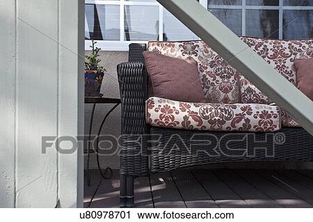 Wicker chair at porch, Laguna Beach, California, USA View Large Photo Image Stock Image - Wicker chair at porch, Laguna Beach, California, USA. Fotosearch