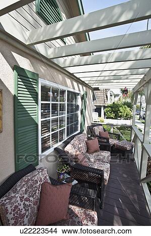 Picture - Wicker chairs at porch, Laguna Beach, California, USA. Fotosearch